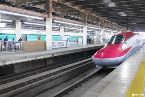 Tohoku Shinkansen bullet train traveling through Aomori