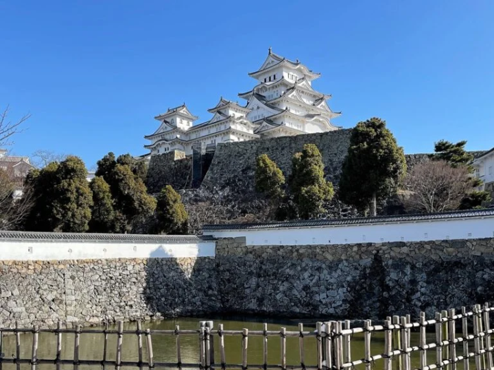 Himeji Castle tower seen from across the Mikuni moat 