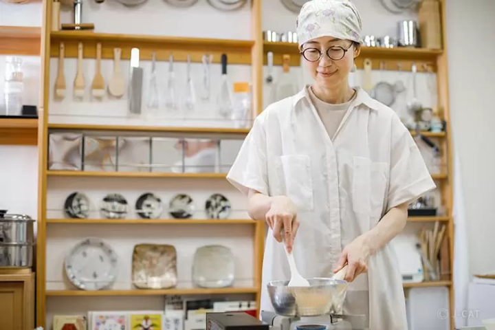 chef stirring the batter