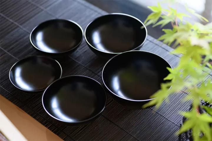five black bowls