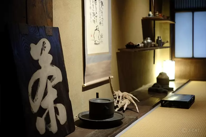 assortment of tea utensils in tatami room 