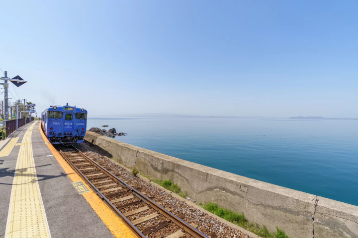train next to the sea