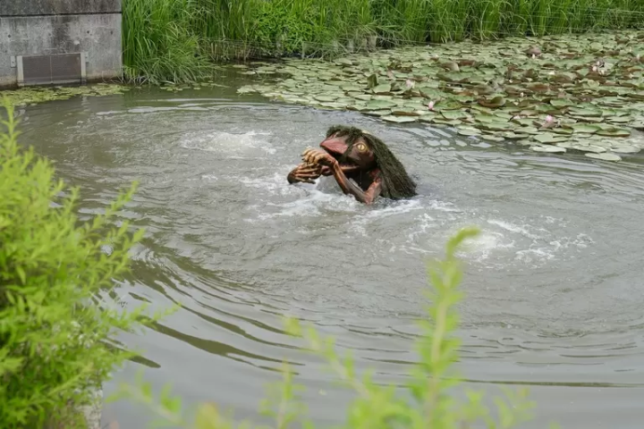 Gajiro, or "red kappa", emerging from the pond