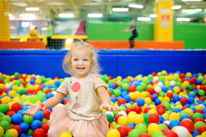child in ball pit