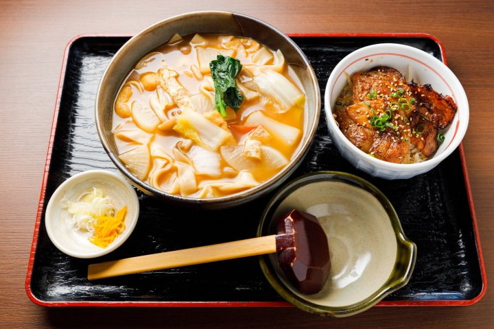 The soup is miso-based and you can also add a small bowl of rice as an option. 