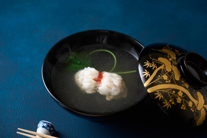 kaiseki soup with decorative fish dish