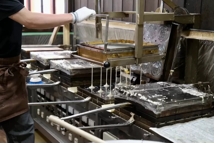 The traditional process for making senbei at Mitsumori Honpo