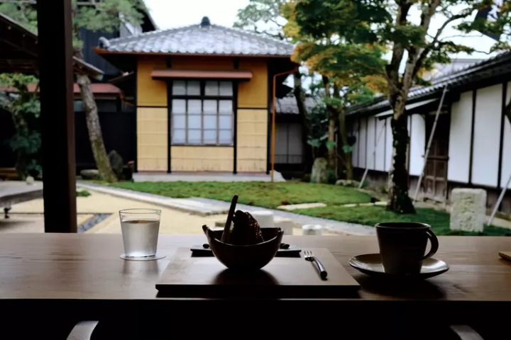 Get a seat next to the window to admire the mesmerizing stone garden view 