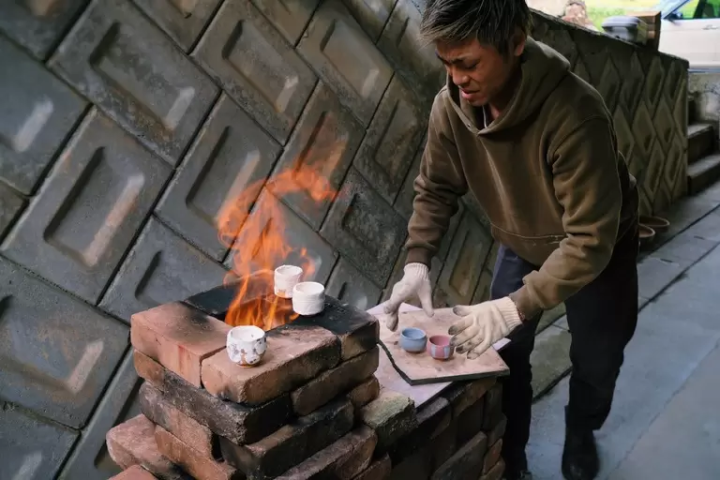 The process of firing a glazed sake cup