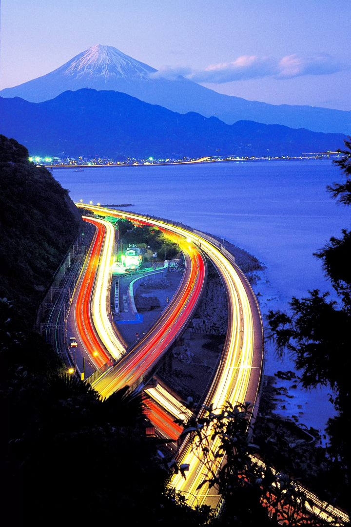 Evening view of Mt. Fuji and the expressway from Satta Pass in Yui 