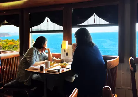 Dining experience on the Tango Kuromatsu (restaurant train) crossing the Yura River railway bridge