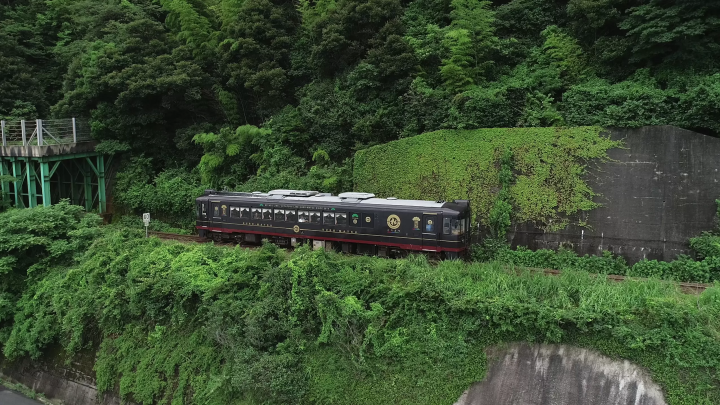 Dining experience on the Tango Kuromatsu (restaurant train) crossing the Yura River railway bridge