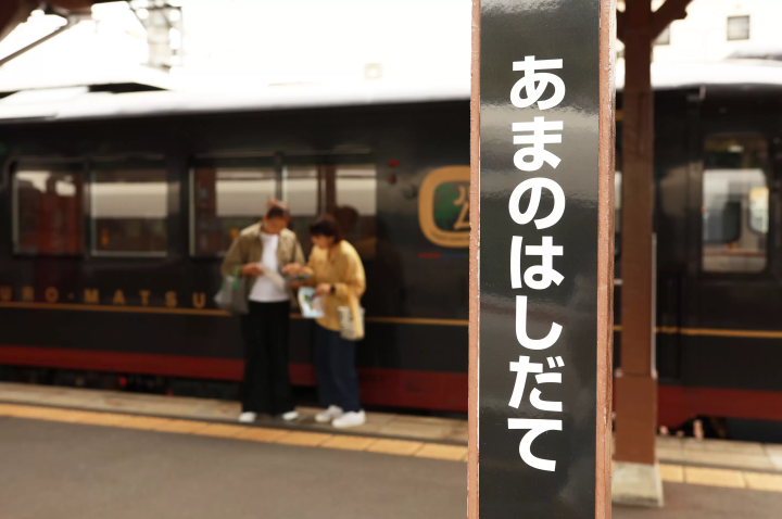 Dining experience on the Tango Kuromatsu (restaurant train) crossing the Yura River railway bridge