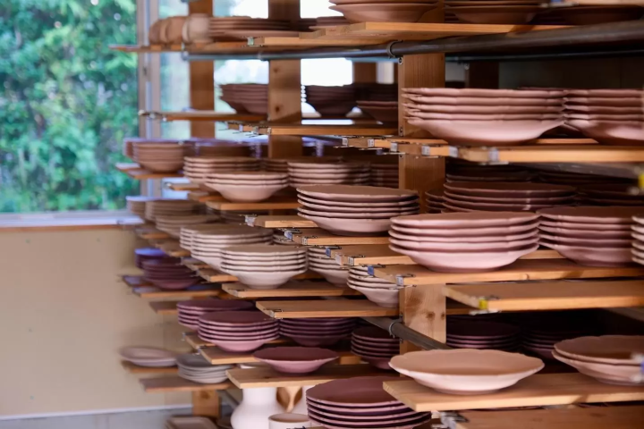 Awaji pottery at Awabiware laboratory – ceramic pieces drying on shelves before glazing