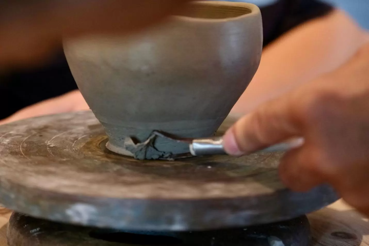 Creating a coffee cup at the Awaji pottery workshop at Kakuraigama – hands-on Japanese ceramics experience