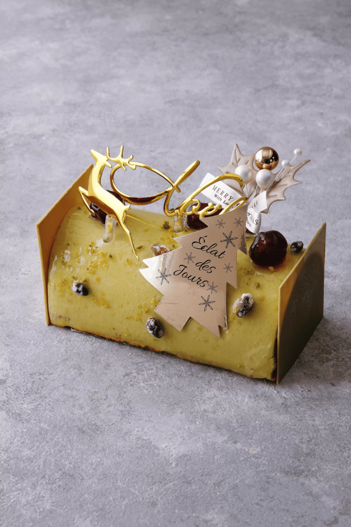 An elegant delight featuring griotte cherries and vanilla hidden inside a rich pistachio mousse. A sophisticated flavor profile.